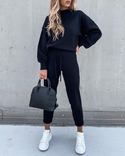 Ensemble maille bleu nuit, pull col montant et pantalon
