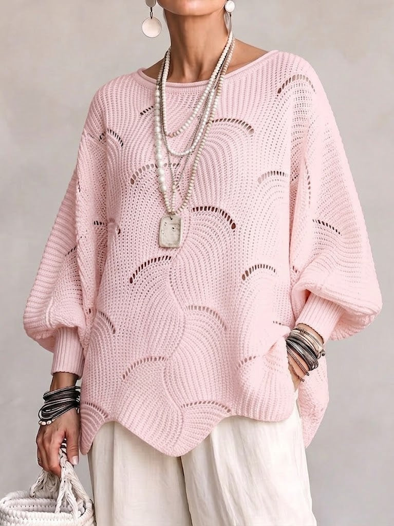 Pull ajouré rose porté