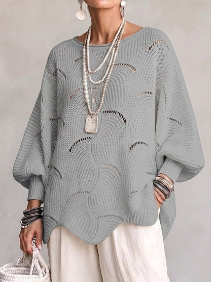 Pull ajouré gris porté